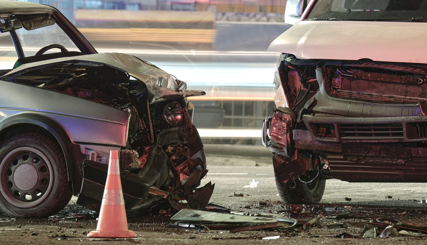 aftermath of a collision between two cars. Car accident. Auto accident. Motor vehicle accident.